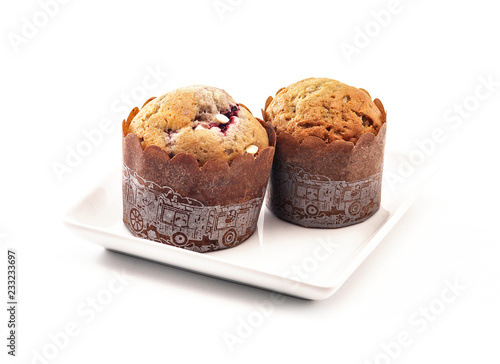 Delicious muffins on white background
