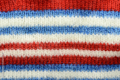 knitted textile background full frame in red white blue color