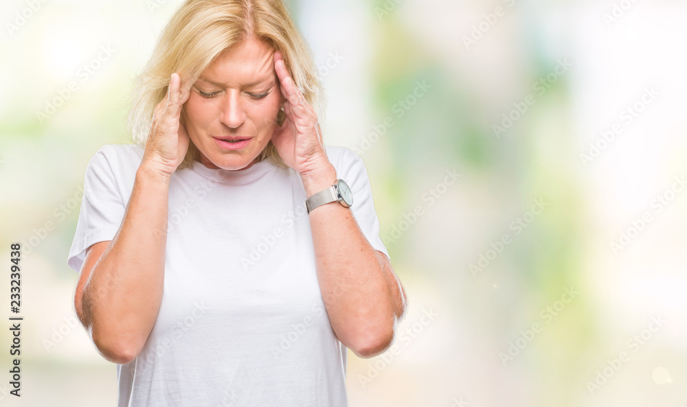 Middle age blonde woman over isolated background with hand on head for pain in head because stress. Suffering migraine. Middle age blonde woman over isolated background with hand on head for pain in head because stress. Suffering migraine.
