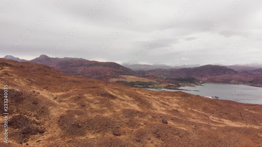 Aerial drone shot of a mountains and lochs in Highlands of Scotland Aerial drone shot of a mountains and lochs in Highlands of Scotland