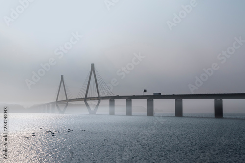 faro bridge in foggy weather, the highway bridge over the Storstroem in denmark connects the islands and is a part of the vogelfluglinie (bird flight line) © Maren Winter