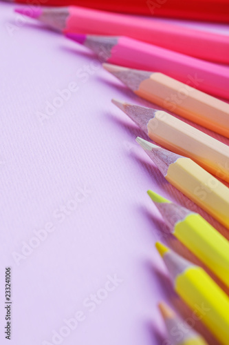 Bright color palette of crayons on the table