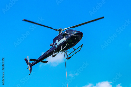 Fototapeta Naklejka Na Ścianę i Meble -  Helicopter flying sky in Lavaux Switzerland