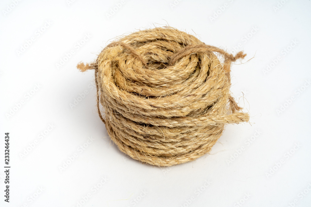 Coil of fiber rope sisal small on isolated white background