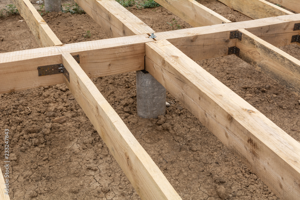 Housing frame assembly. Installation of residential building base of a-type frame house. Housing frame assembly. Installation of residential building base of a-type frame house.
