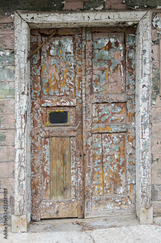 Wallpaper Mural Old wooden weathered door with the old paint flaking Torontodigital.ca