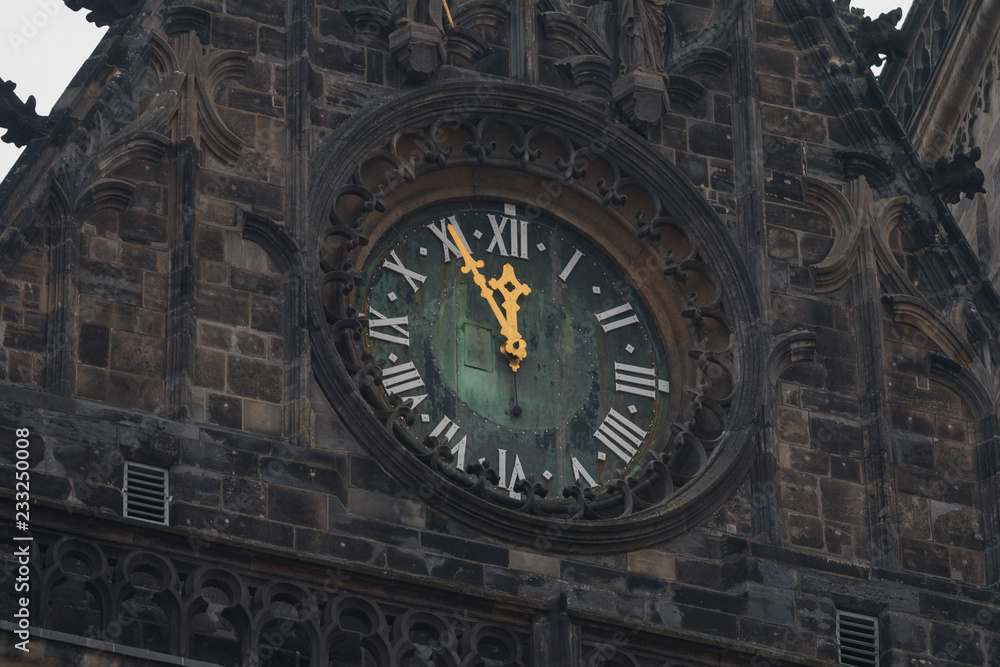 Tower clock five minutes to twelve Tower clock five minutes to twelve