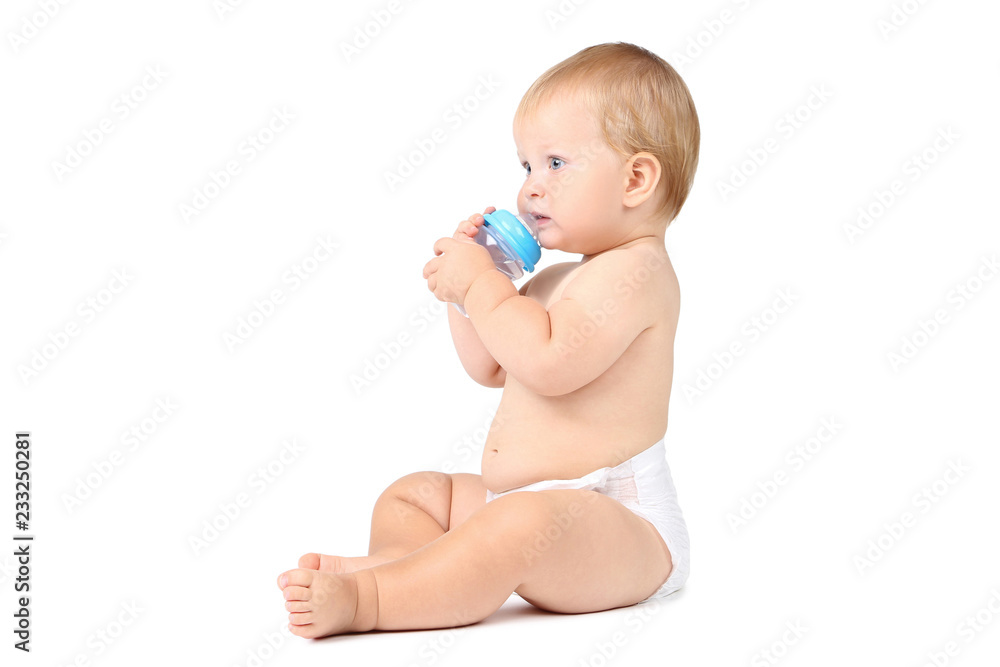 Baby boy drinking water from bottle isolated on white background Baby boy drinking water from bottle isolated on white background