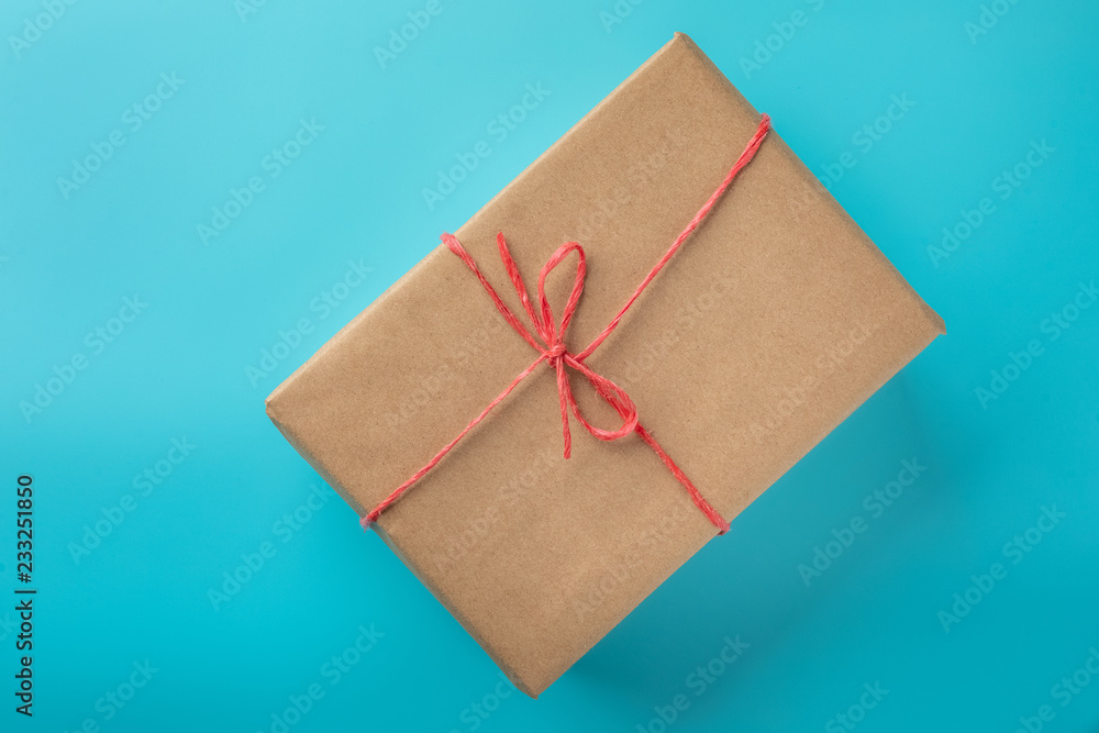 Flat lay of gift on blue background Flat lay of gift on blue background