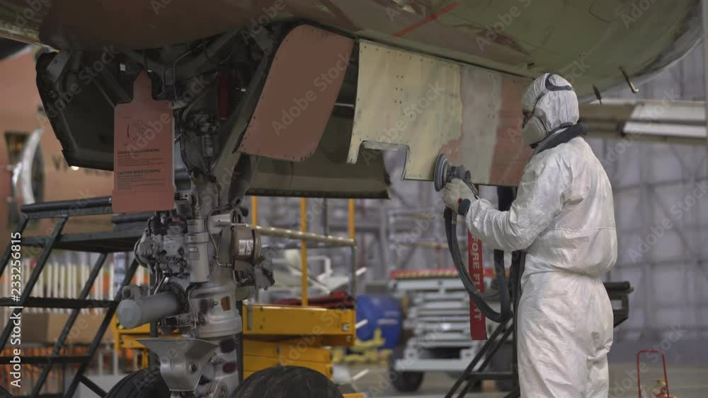 Repair of the aircraft fuselage. The color of the fuselage of the aircraft alyet. The plane goes to the hangar for repairs. The broken wing of the plane. The plane after the accident on the repair. 4k Repair of the aircraft fuselage. The color of the fuselage of the aircraft alyet. The plane goes to the hangar for repairs. The broken wing of the plane. The plane after the accident on the repair. 4k
