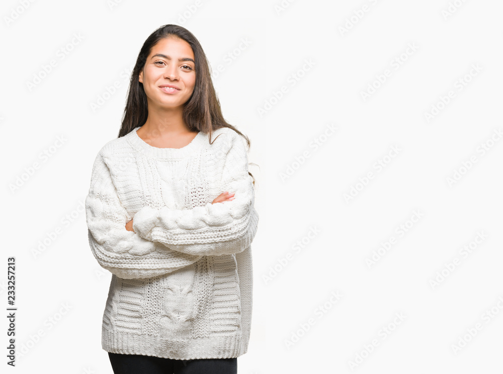 Young beautiful arab woman wearing winter sweater over isolated background happy face smiling with crossed arms looking at the camera. Positive person. Young beautiful arab woman wearing winter sweater over isolated background happy face smiling with crossed arms looking at the camera. Positive person.