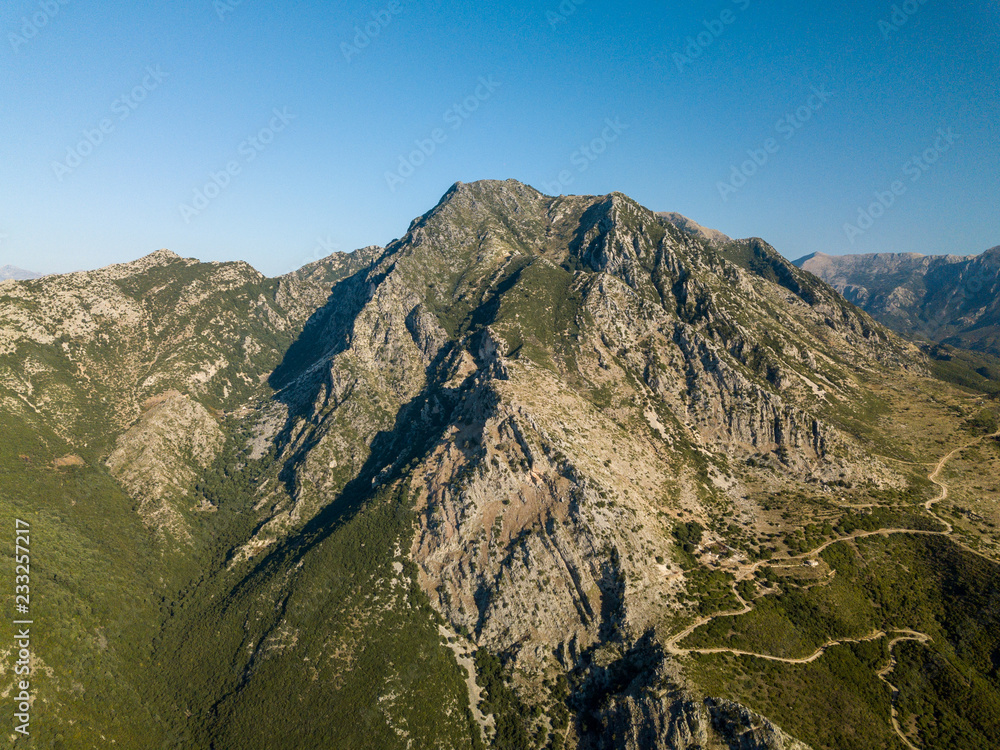 View of Albanian alps and windy road (Borsh, Albania)