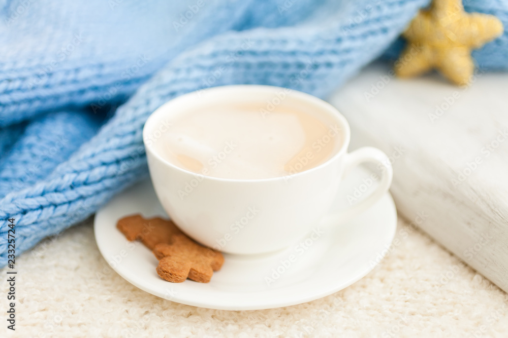 Cup of hot coffee with christmas gingerbread cookie man, traditional holiday sweet. Winter background Cup of hot coffee with christmas gingerbread cookie man, traditional holiday sweet. Winter background