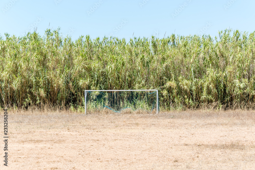 Fototapeta premium Door and soccer field on the island of Porquerolles