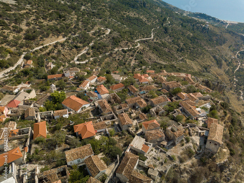 Drone view of Upper Qeparo, South Albania.  Half abandoned village in Albania photo