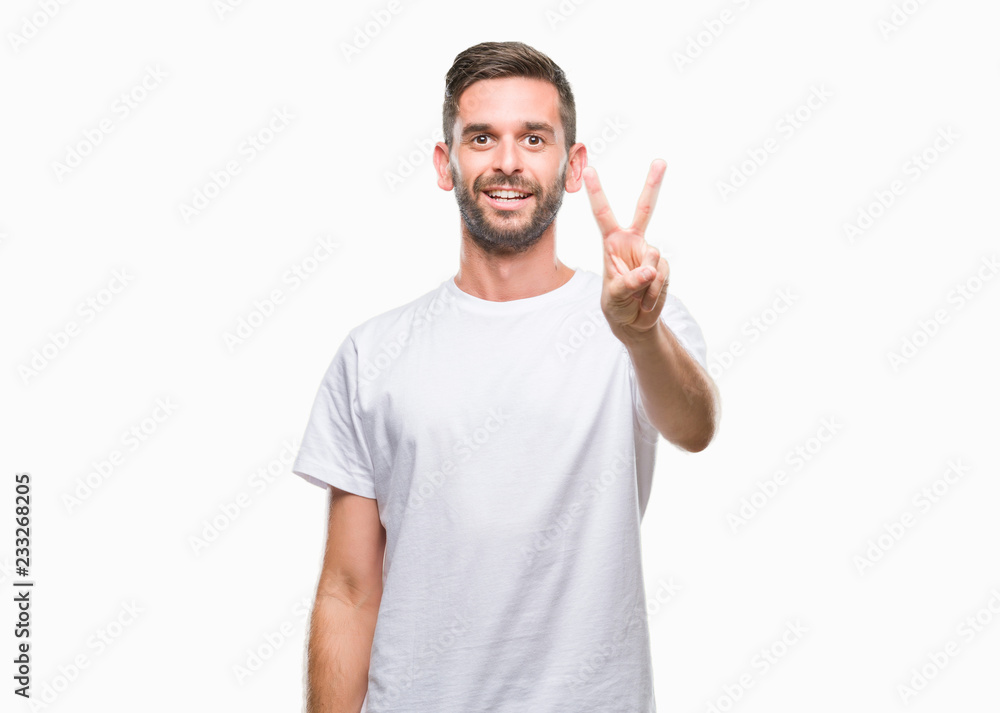 Young handsome man over isolated background showing and pointing up with fingers number two while smiling confident and happy. Young handsome man over isolated background showing and pointing up with fingers number two while smiling confident and happy.