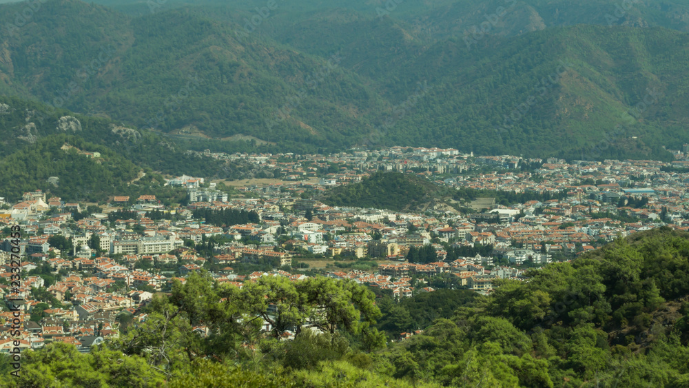 Mountain town panoramic view. city between the hills