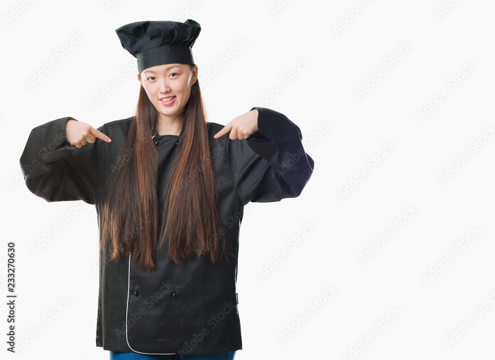 Young Chinese woman over isolated background wearing chef uniform looking confident with smile on face, pointing oneself with fingers proud and happy. Young Chinese woman over isolated background wearing chef uniform looking confident with smile on face, pointing oneself with fingers proud and happy.