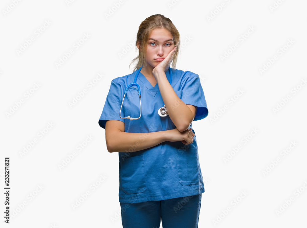 Young caucasian doctor woman wearing surgeon uniform over isolated background thinking looking tired and bored with depression problems with crossed arms. Young caucasian doctor woman wearing surgeon uniform over isolated background thinking looking tired and bored with depression problems with crossed arms.