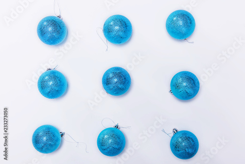 Christmas composition. Christmas balls on white background. Flat lay, top view, close up. Xmas. Merry Christmas and Happy Holidays.