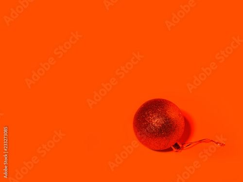 Christmas ball toy on a red background