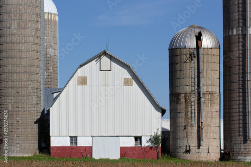 Grouping of Silos and a Barn in Rural United States