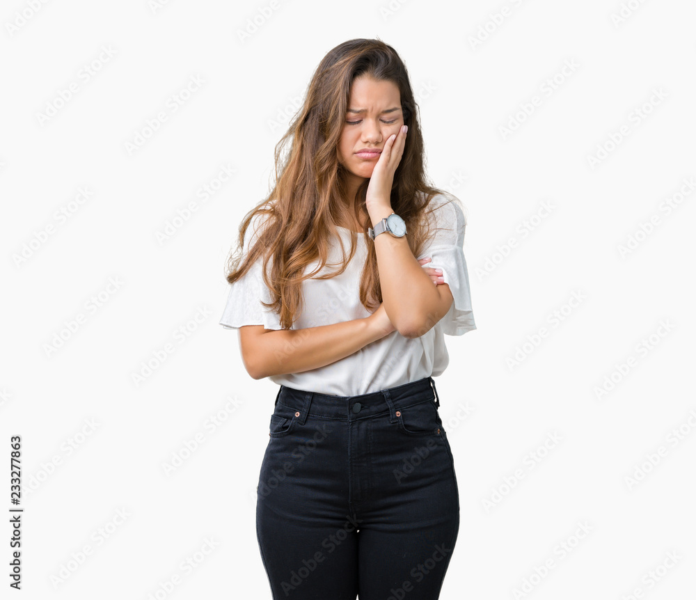 Young beautiful brunette business woman over isolated background thinking looking tired and bored with depression problems with crossed arms. Young beautiful brunette business woman over isolated background thinking looking tired and bored with depression problems with crossed arms.