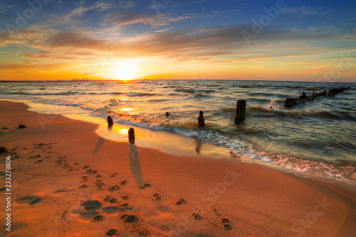 Amazing sunset at Baltic sea beach in Poland