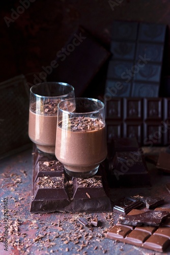 Chocolate panna cotta in dessert glasses photo