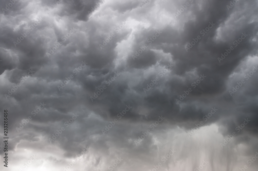 Dramatic cumulus storm clouds with rain Dramatic cumulus storm clouds with rain