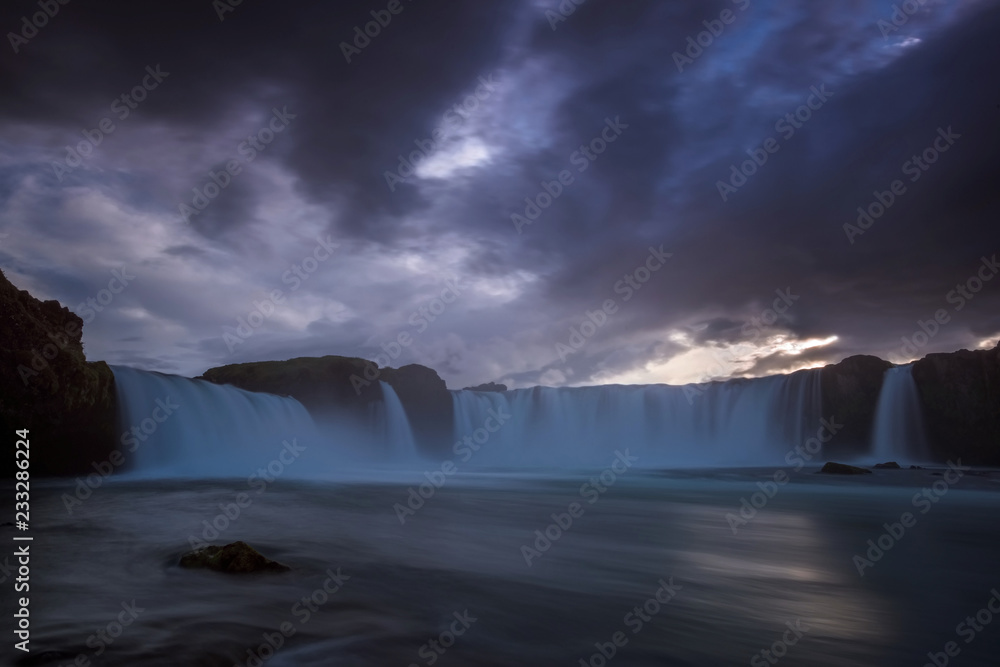 Fototapeta premium Waterfall Godafoss is the place where the lawspeaker Þorgeir Ljósvetningagoði made Christianity the official religion of Iceland. Without war and without violence they left the pagan gods right here!