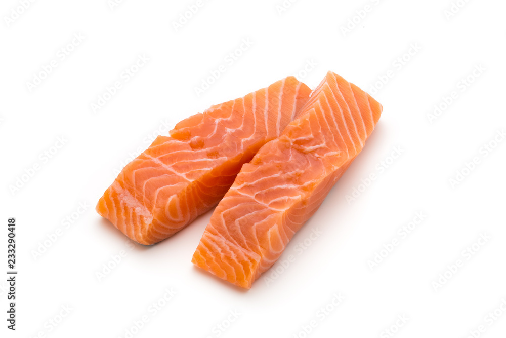 Fresh salmon fillet with basil on the white background. Fresh salmon fillet with basil on the white background.