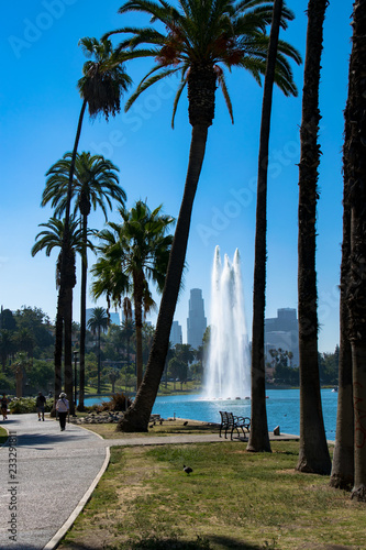 The fountain at Echo Park in Los Angeles, California with the downtown skyline in the background photo