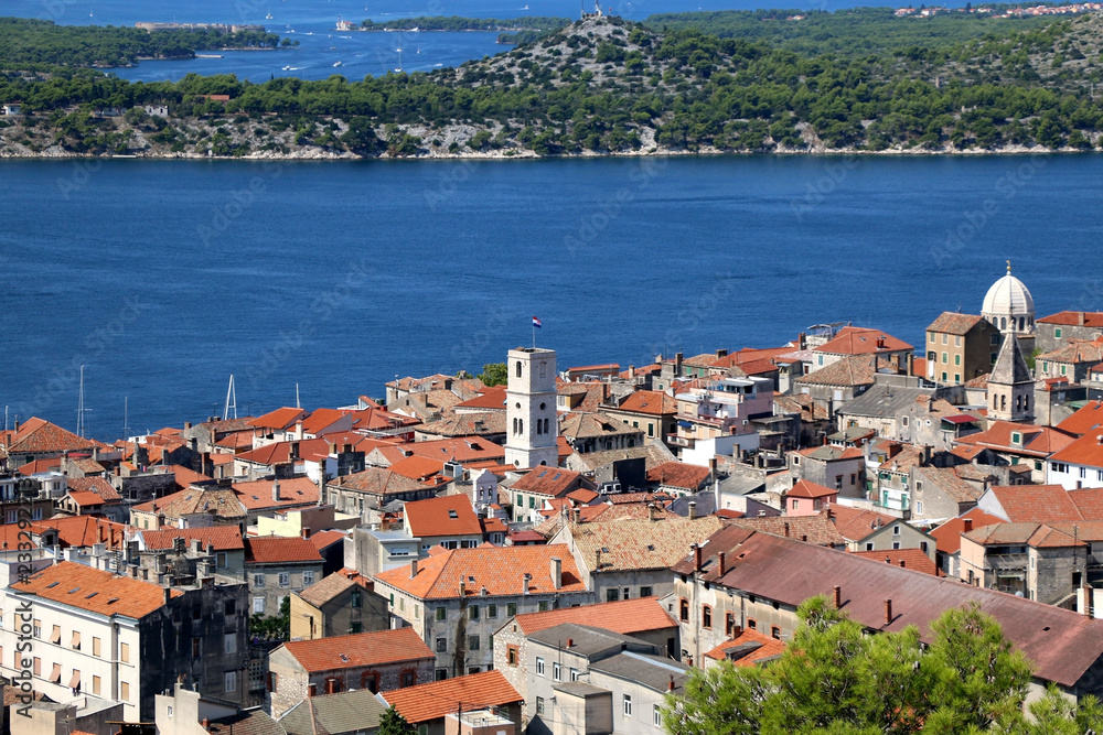 Historic city centre of Sibenik, Croatia with the dome of the Cathedral of St. James, famous UNESCO World Heritage Site. Adriatic Sea in the background. View from the Barone Fortress. 