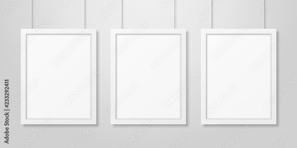 Three Vector Realistic Modern Interior White Blank Vertical A4 Wooden Poster Picture Frame Set Hanging on the Ropes on White Wall Mock-up. Empty Poster Frames Design Template for Mockup, Presentation Three Vector Realistic Modern Interior White Blank Vertical A4 Wooden Poster Picture Frame Set Hanging on the Ropes on White Wall Mock-up. Empty Poster Frames Design Template for Mockup, Presentation