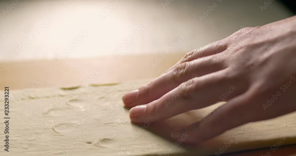 Preparing cookies for baking. Woman working in the kitchen. Hands close-up Preparing cookies for baking. Woman working in the kitchen. Hands close-up