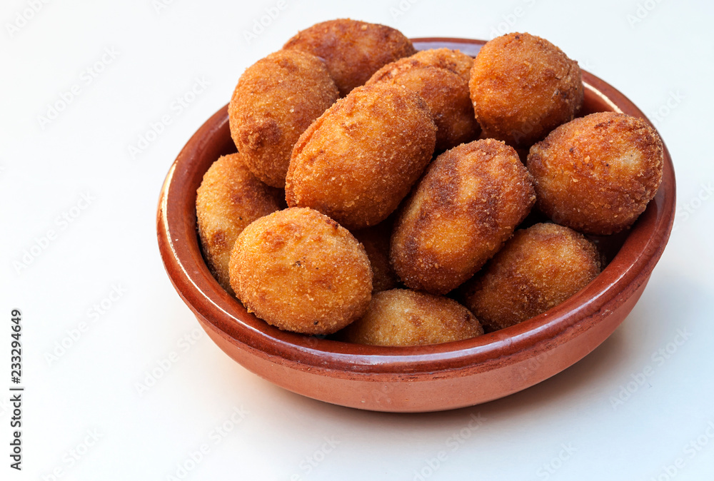 Croquettes surrounded by white background Croquettes surrounded by white background
