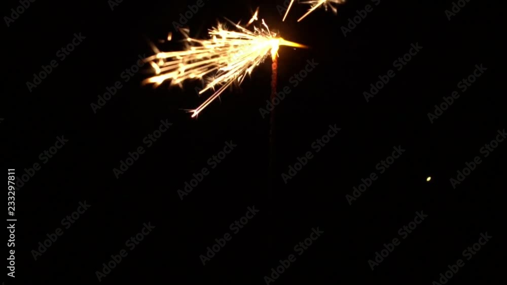 Sparks and festive fires on a black background. Fireworks Christmas.