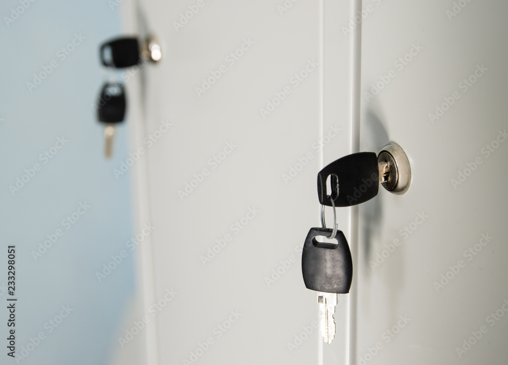 keys in the door of a private locker keys in the door of a private locker