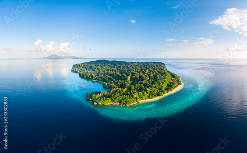 Aerial view tropical beach island reef caribbean sea. Indonesia Moluccas archipelago, Banda Islands, Pulau Ay. Top travel tourist destination, best diving snorkeling. photo