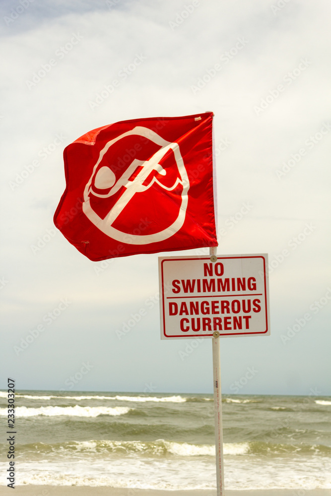 warning sign on the beach