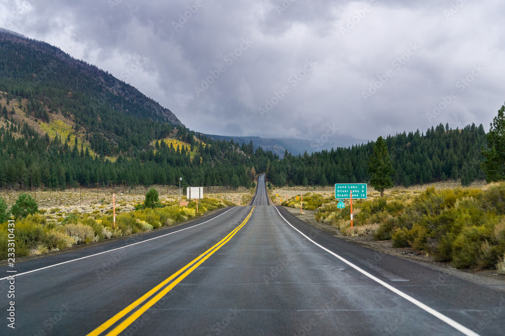 Fototapeta premium Travelling on the June Lake Loop on a rainy day, Eastern Sierra mountains, California