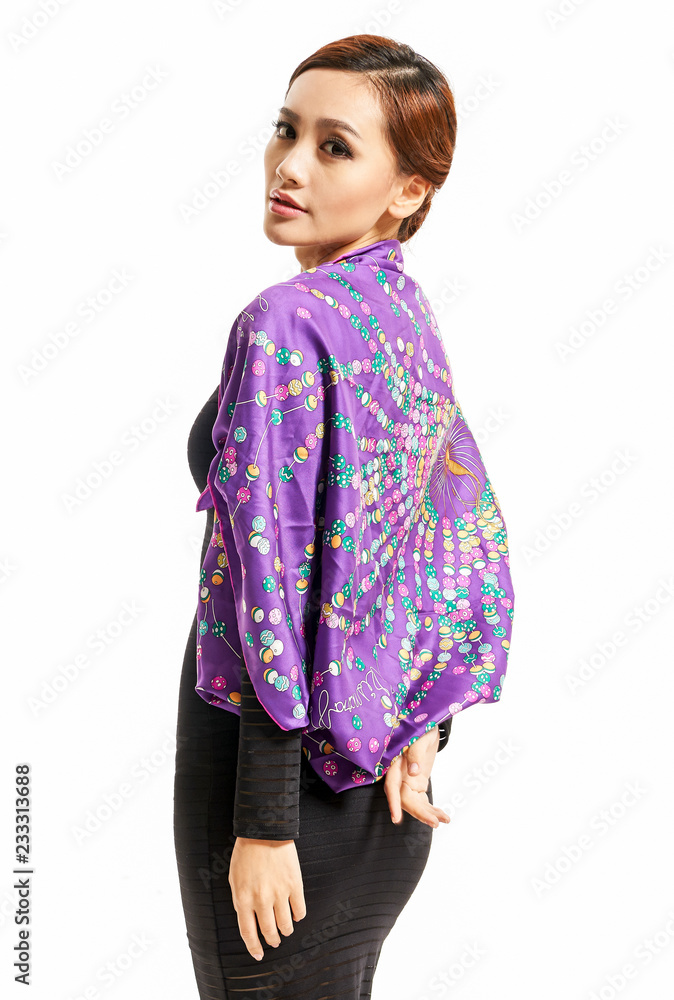 Well-dressed Asian girl taking a portrait portrait in white background Well-dressed Asian girl taking a portrait portrait in white background
