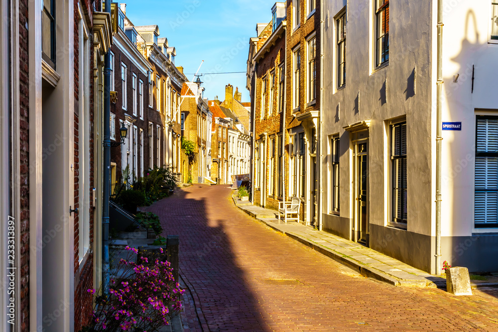 Obraz premium Sunset over Narrow Streets in the Historic City of Middelburg in Zeeland Province, the Netherlands