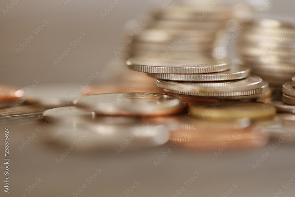 Rows of coins on the table in banking and finance concept. Saving concept. Investment, Economy. Soft focus and dark style. Rows of coins on the table in banking and finance concept. Saving concept. Investment, Economy. Soft focus and dark style.