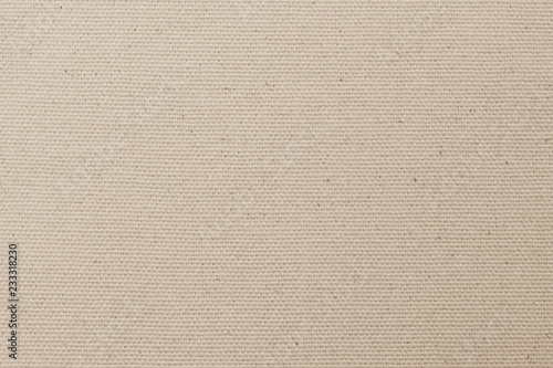 Canvas burlap fabric texture background for arts painting in beige light sepia cream tan brown pastel color