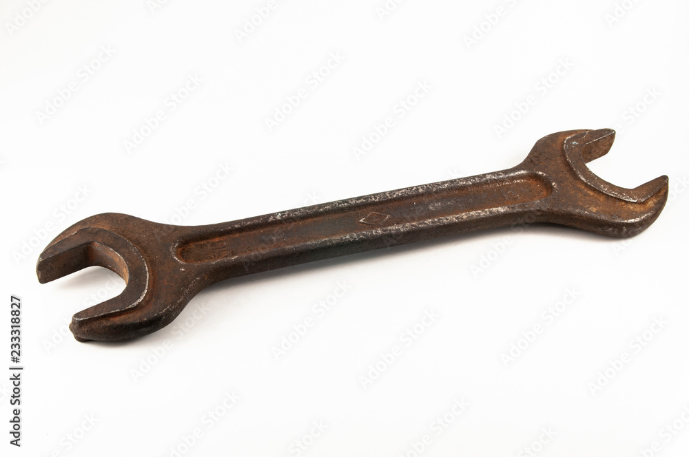 old rusty wrench on white background old rusty wrench on white background
