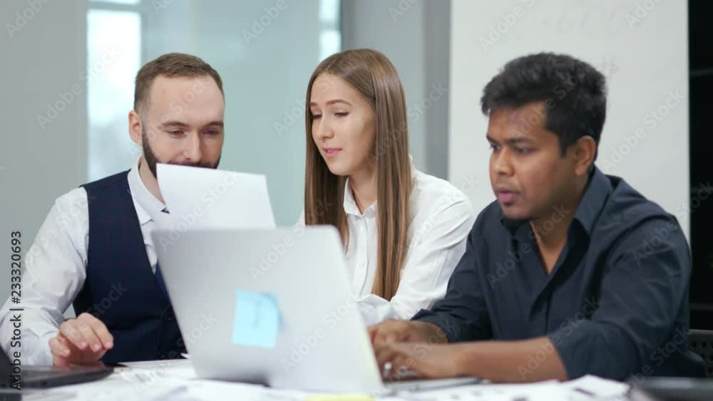 Multiethnic business people having team meeting and brainstorming at modern office Multiethnic business people having team meeting and brainstorming at modern office