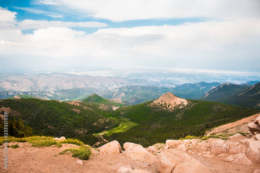 Top of a Mountain Overlooking a Vast Valley of Forest and Cities from Colorado Springs Pikes Peak