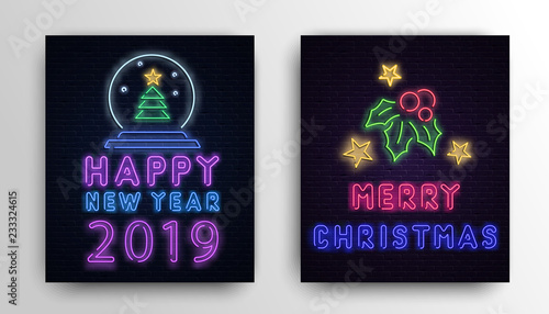 Christmas and New Year 2019 neon luminous cards on brick textured background.